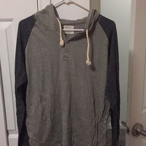 Hooded gray shirt with blue long sleeves